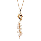 Seahorse Necklace in 18ct Gold with a cluster of Pearls