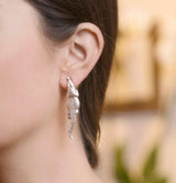 Model Wearing Crocodile Stud Earrings in Sterling Silver - Large