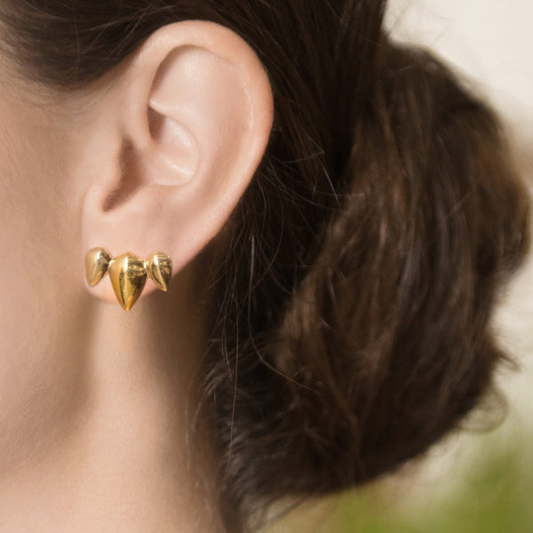 Model Wearing Pangolin Crescent Earrings in 18ct Gold